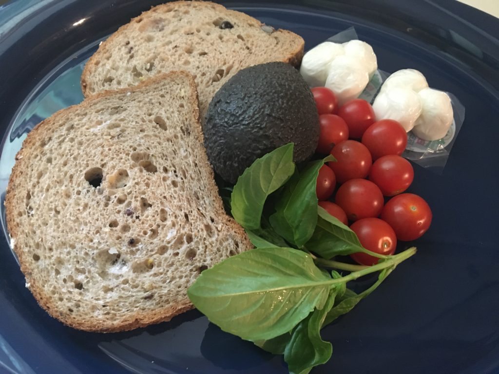 Sprouted grain bread, avocado, grape tomatoes, fresh mozzarella, basil