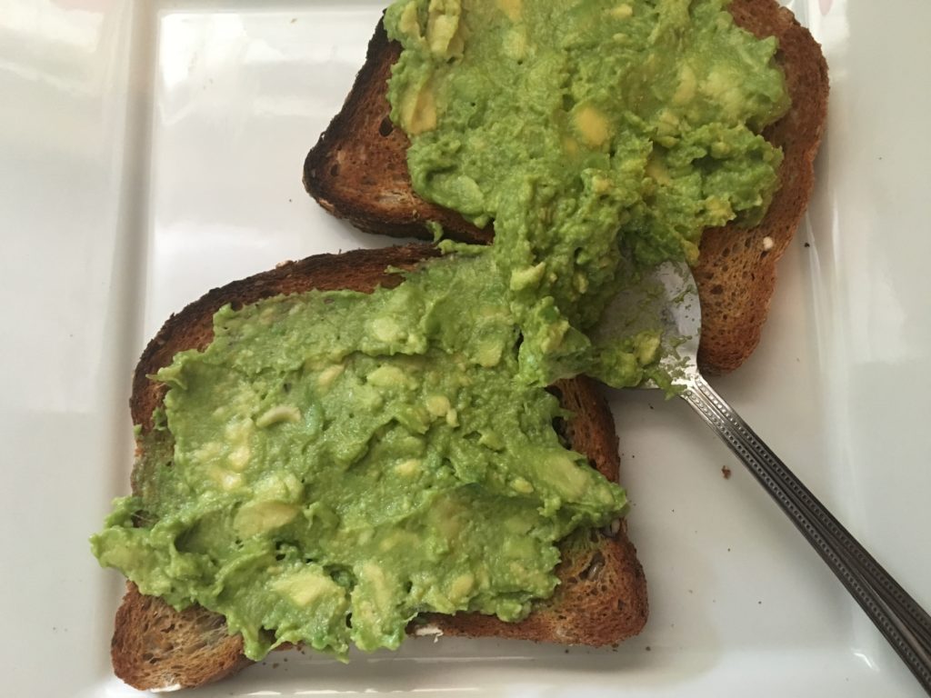 avocado mixture spread onto the toast